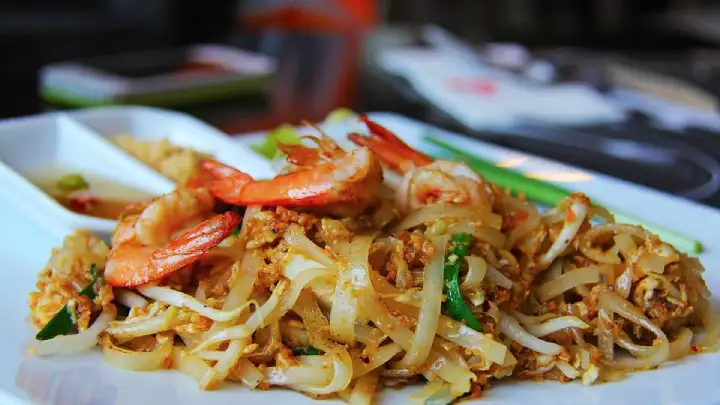 Experience the vibrant flavors of Thailand with this authentic Pad Thai recipe. A harmonious blend of stir-fried noodles, savory sauce, and fresh ingredients awaits!