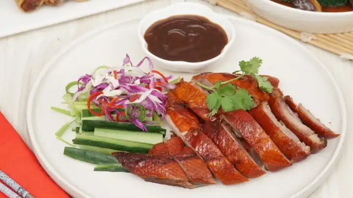 Experience the authentic flavors of China with this homemade Peking Duck recipe. A crispy skin, tender meat, and traditional accompaniments await!